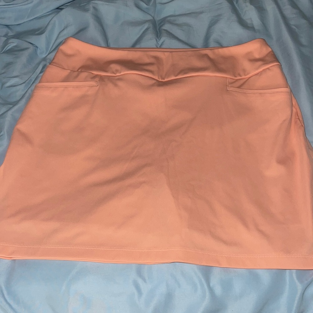 Peach Adidas golf skort